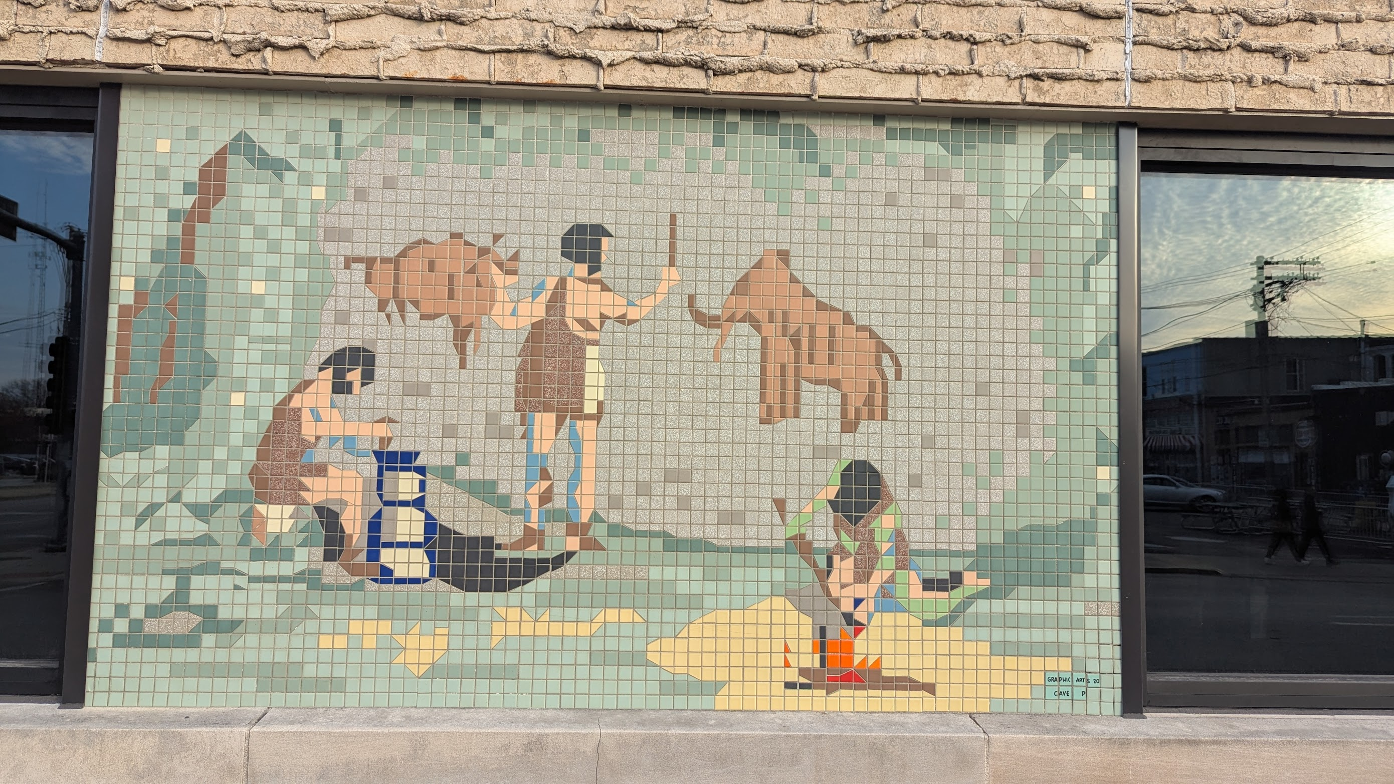 a mosaic of a cave painting