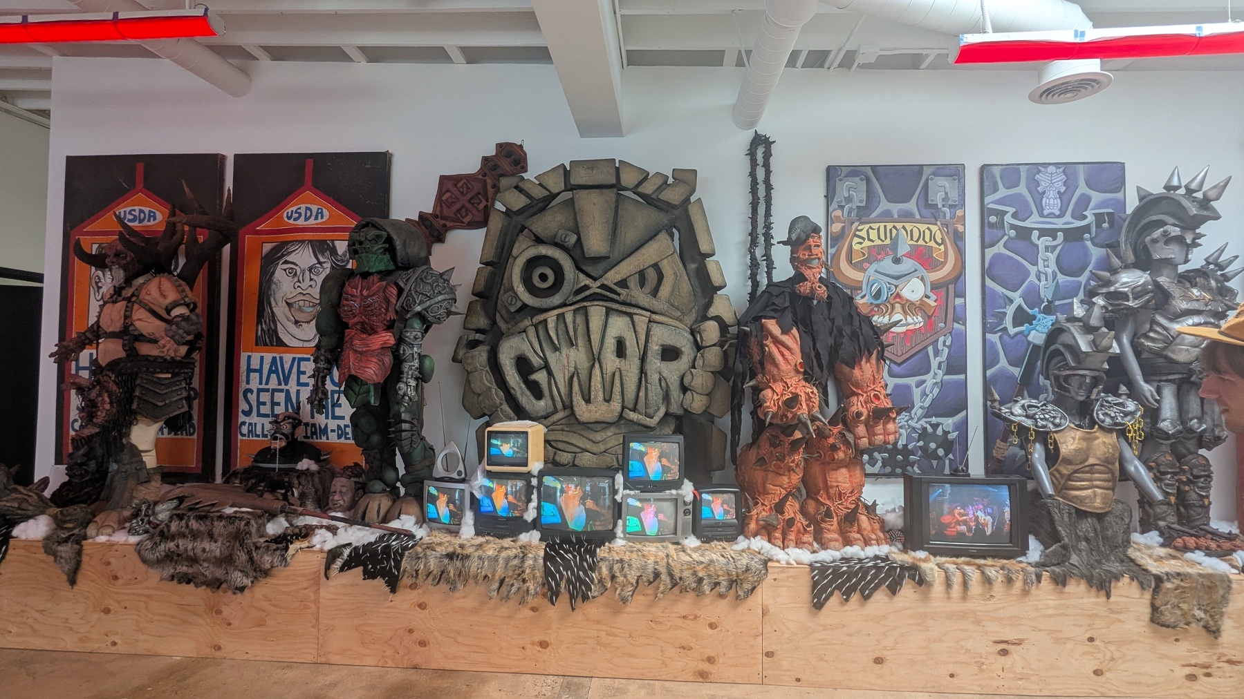 A display of elaborate costumes of horror metal band GWAR