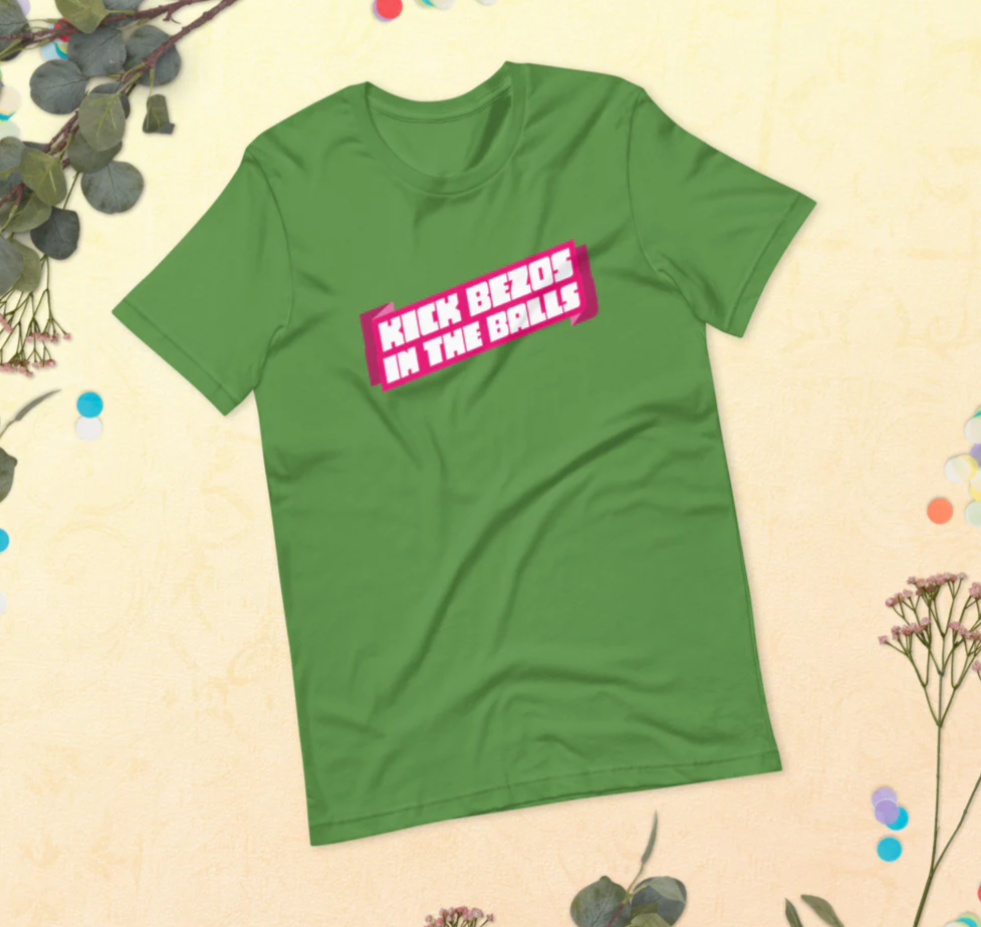 A green Tshirt that reads "Kick Bezos in the Balls"