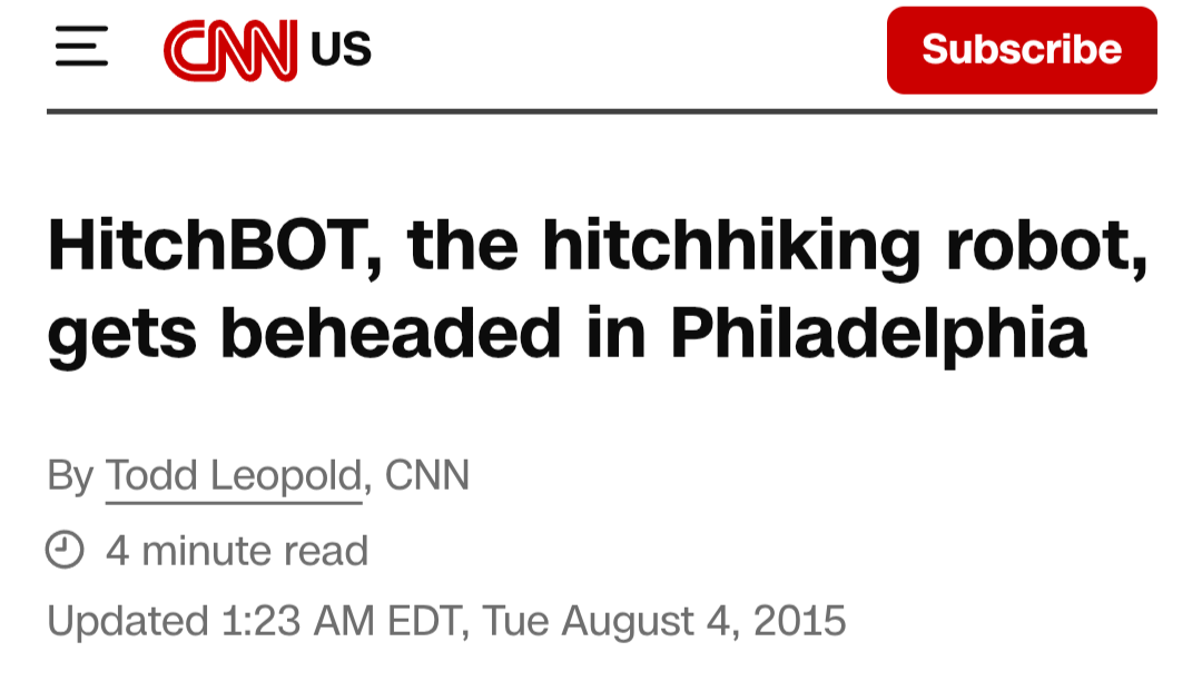 A CNN article headline reports that HitchBOT, a hitchhiking robot, was beheaded in Philadelphia.